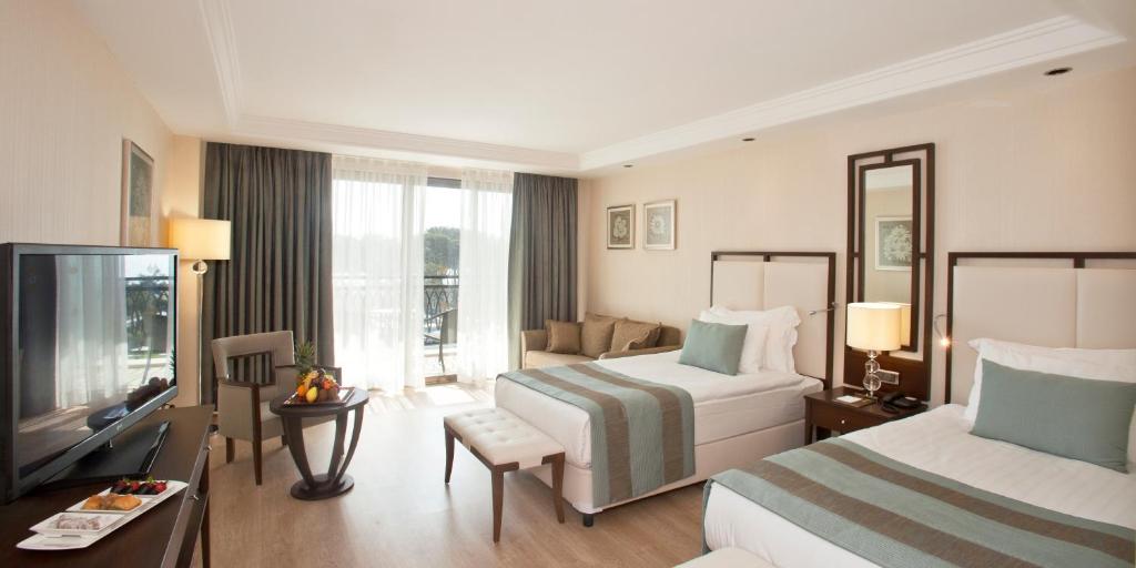 07-اتاق-هتل-5-ستاره-جوجو-پریمیر- Juju-Premier-Palace-Room.jpg