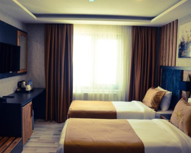 اتاق هتل 4 ستاره روا ورلد وان Rua World Hotel Van.jpg