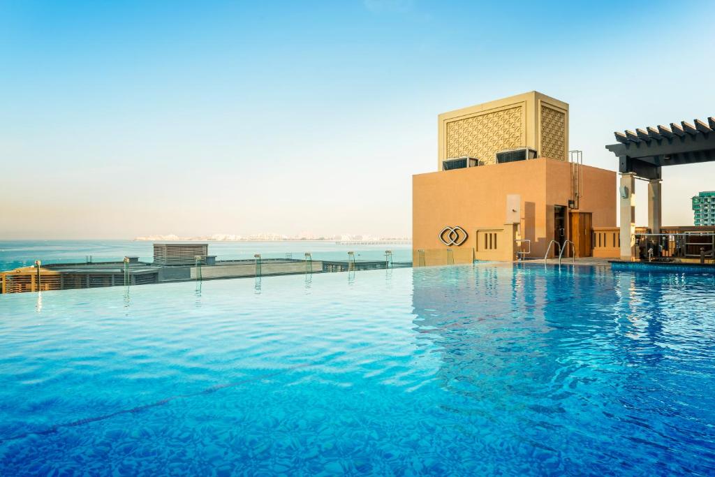 35-استخر-هتل-5-ستاره-سوفیتل-جمیرا-بیچ- View Sofitel-Dubai-Jumeirah-Beach-Pool.jpg