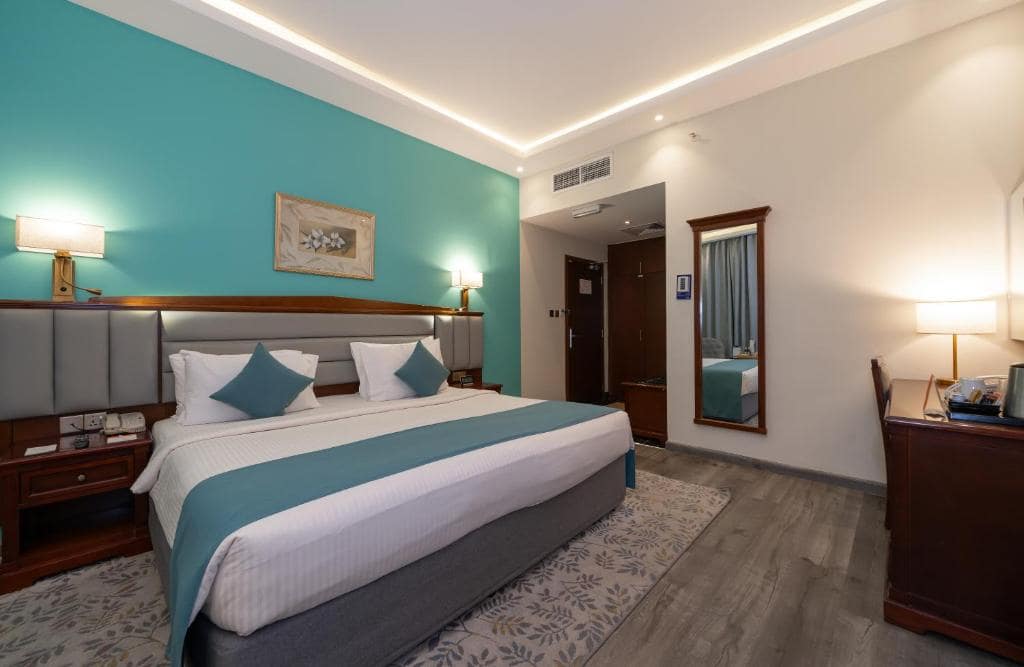 23-اتاق-خواب-هتل-3-ستاره-هاوارد-جانسون-بر-دبی- Howard-Johnson-Bur-Dubai-Bedroom.jpg