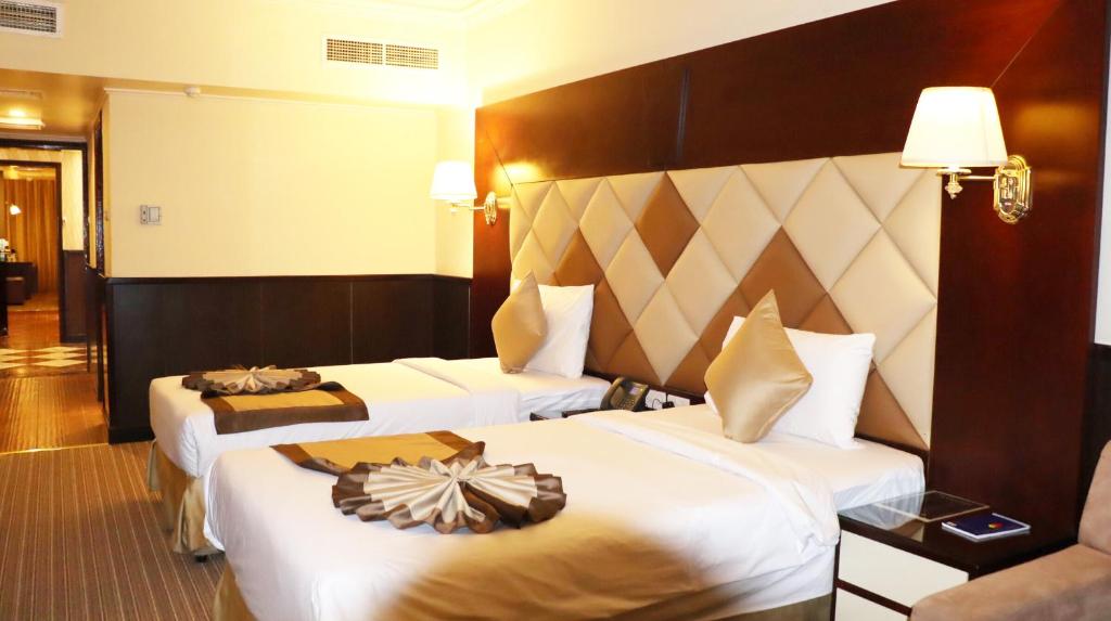 08-اتاق-خواب-هتل-3-ستاره-گلف-این-دبی- Golf-Inn-Hotel-Dubai-Bedroom.jpg