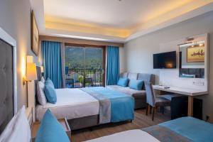 09-اتاق-هتل-4-ستاره-فور-ریزورت-اند-اسپا-آنتالیا- Fore-Resort-&-Spa-Hotel-Antalya-Room.jpg