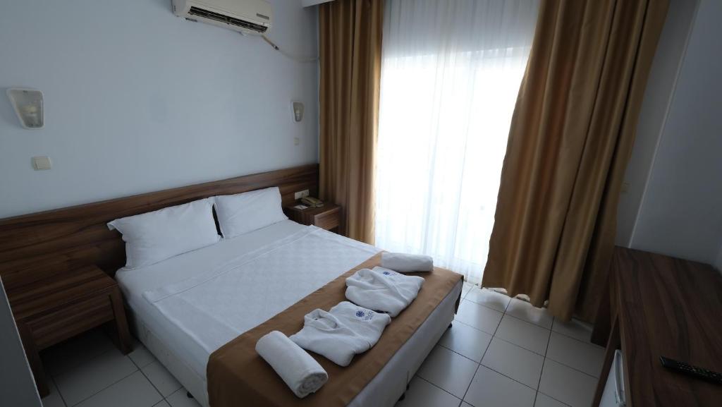 10-اتاق-هتل-4-ستاره-الدار-گاردن-ریزورت-آنتالیا- Eldar-Garden-Resort-Antalya-Room.jpg