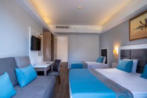 10-اتاق-هتل-4-ستاره-فور-ریزورت-اند-اسپا-آنتالیا- Fore-Resort-&-Spa-Hotel-Antalya-Room.jpg