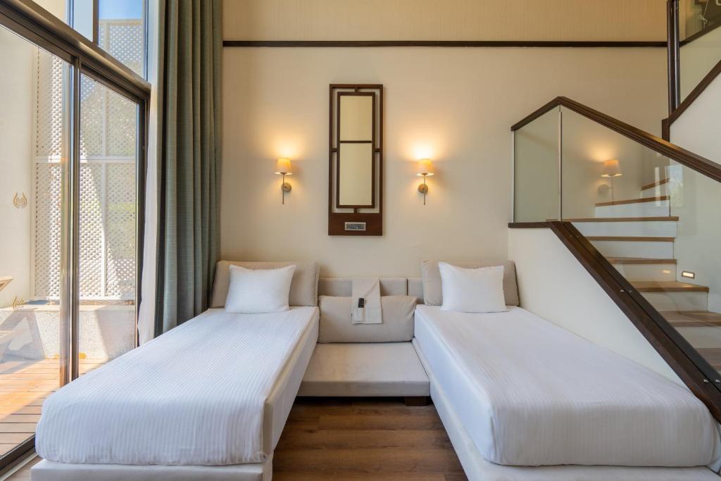 10-اتاق-هتل-5-ستاره-آمارا-پریمیر-پالاس-آنتالیا- Amara-Premier-Palace-Hotel-Antalya-Room.jpg