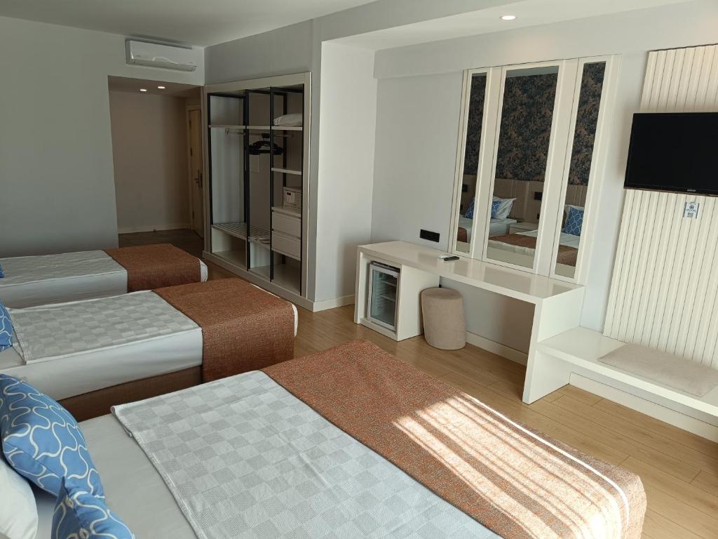 14-اتاق-هتل-4-ستاره-الدار-گاردن-ریزورت-آنتالیا- Eldar-Garden-Resort-Antalya-Room.jpg
