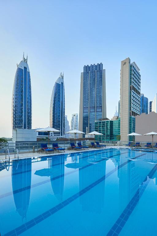 28-استخر-هتل-4-ستاره-رز-ریحان-بای-روتانا-دبی- Rose-Rayhaan-by-Rotana-Dubai-Pool.jpg