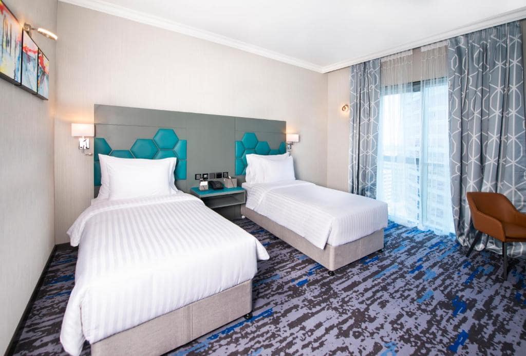 04-اتاق-خواب-هتل-4-ستاره-اج-کریک-ساید-دبی- Edge-Creekside-Hotel-Dubai-Bedroom.jpg