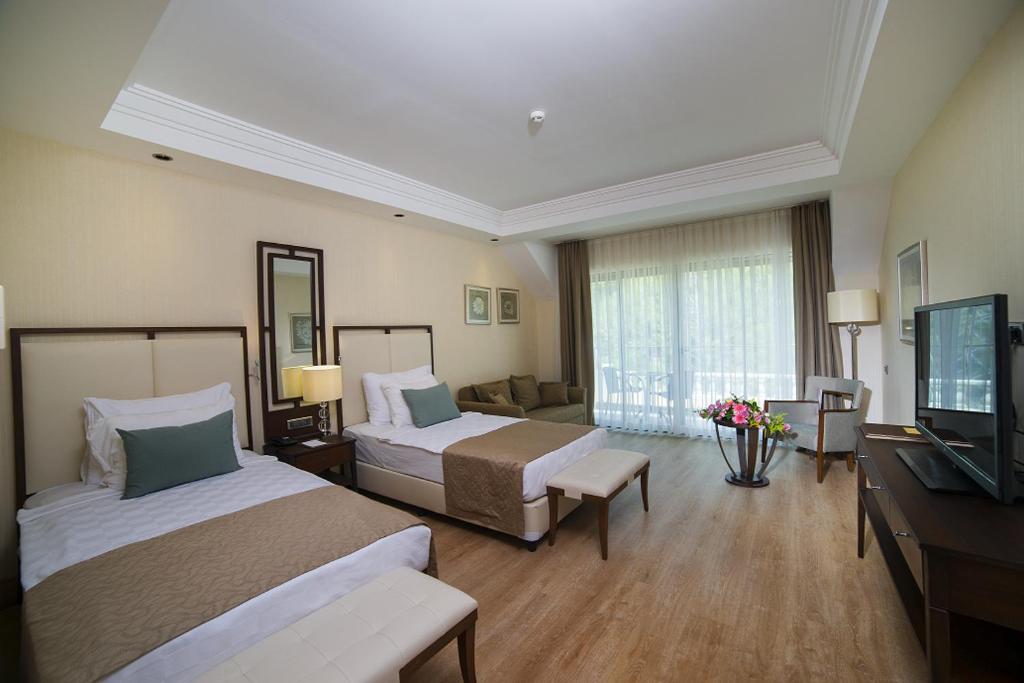 05-اتاق-هتل-5-ستاره-جوجو-پریمیر- Juju-Premier-Palace-Room.jpg