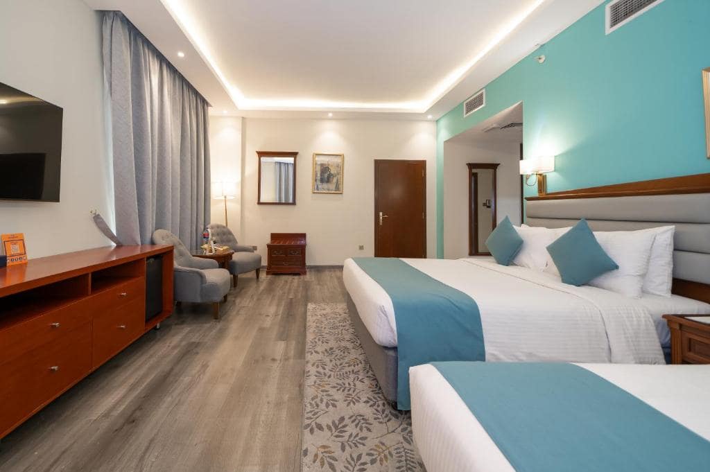 20-اتاق-خواب-هتل-3-ستاره-هاوارد-جانسون-بر-دبی- Howard-Johnson-Bur-Dubai-Bedroom.jpg