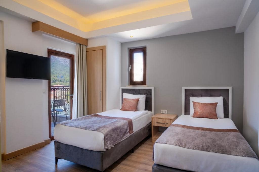 05-اتاق-هتل-4-ستاره-فور-ریزورت-اند-اسپا-آنتالیا- Fore-Resort-&-Spa-Hotel-Antalya-Room.jpg